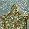 Texture et relief du vase tortue bleu vert or